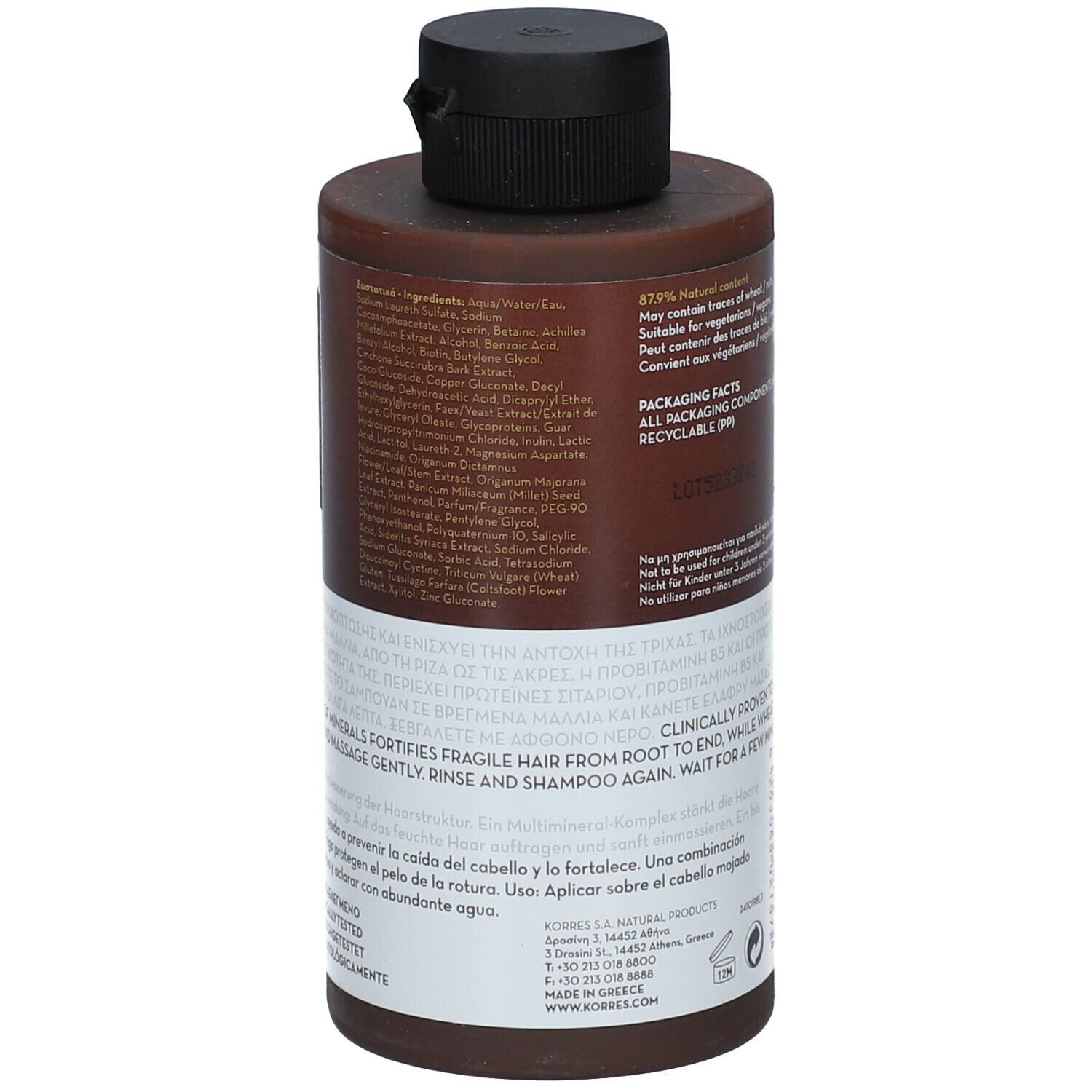 Achterkant van de shampoo fles. Tekst: ingrediënten, verpakkingsinformatie. Alle verpakkingen zijn recyclebaar.