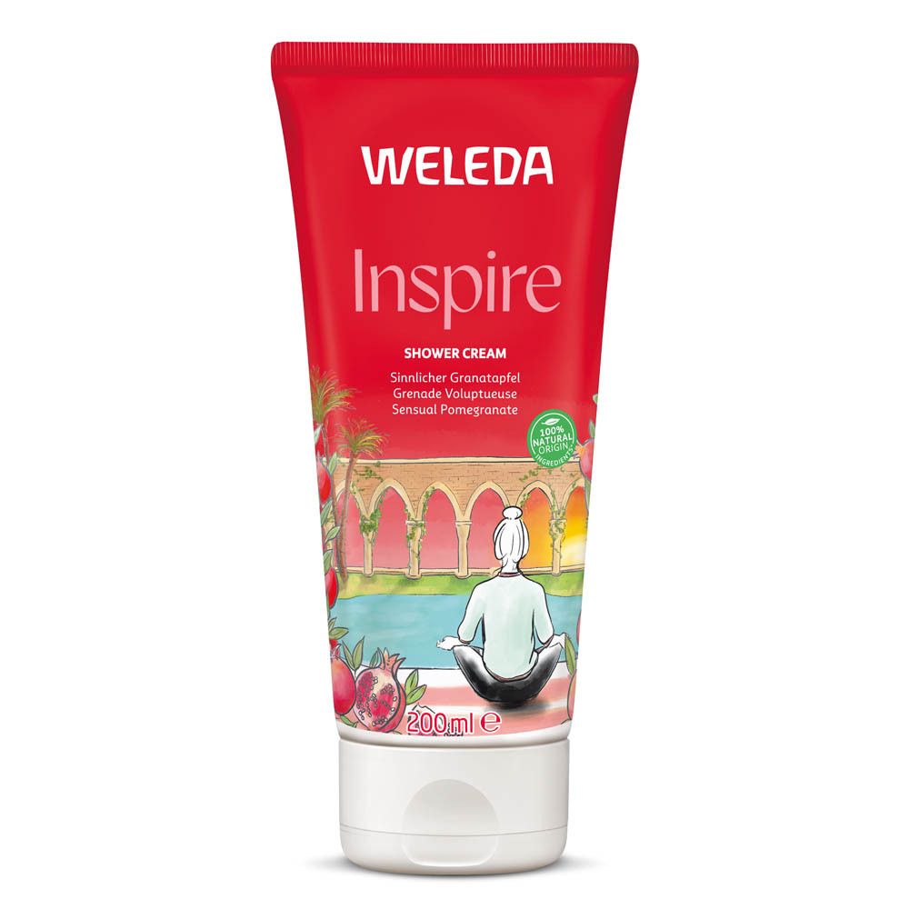 Tube rouge Weleda Duschcreme. Inscription "Inspire" et "Grenade". Illustration d'une femme.