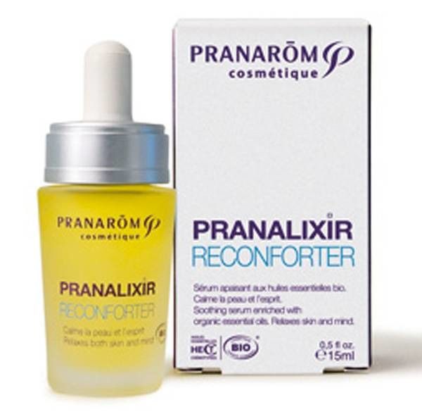 Gelbe Flasche mit Pipette und Karton. Aufschrift: PRANAROM cosmétique, PRANALIXIR RECONFORT, BIO-Zertifizierung.