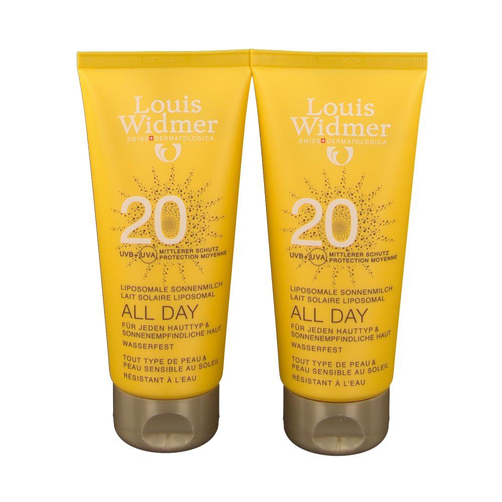 Deux tubes jaunes de crème solaire. Inscription: Louis Widmer, 20, All Day. Lait solaire liposomial. Résistant à l'eau.