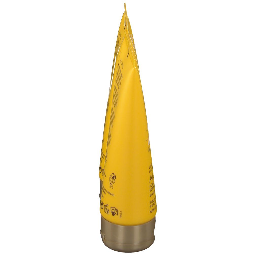 Tube de crème solaire jaune, vue latérale. Inscription: Louis Widmer, texte multilingue. Bouchon métallique.