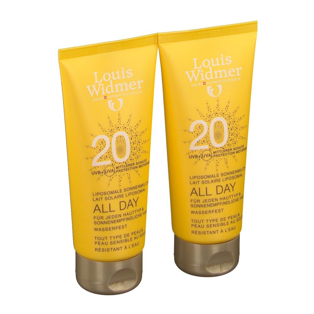 Deux tubes jaunes de crème solaire. Inscription: Louis Widmer, 20, All Day. Lait solaire liposomial. Résistant à l'eau.