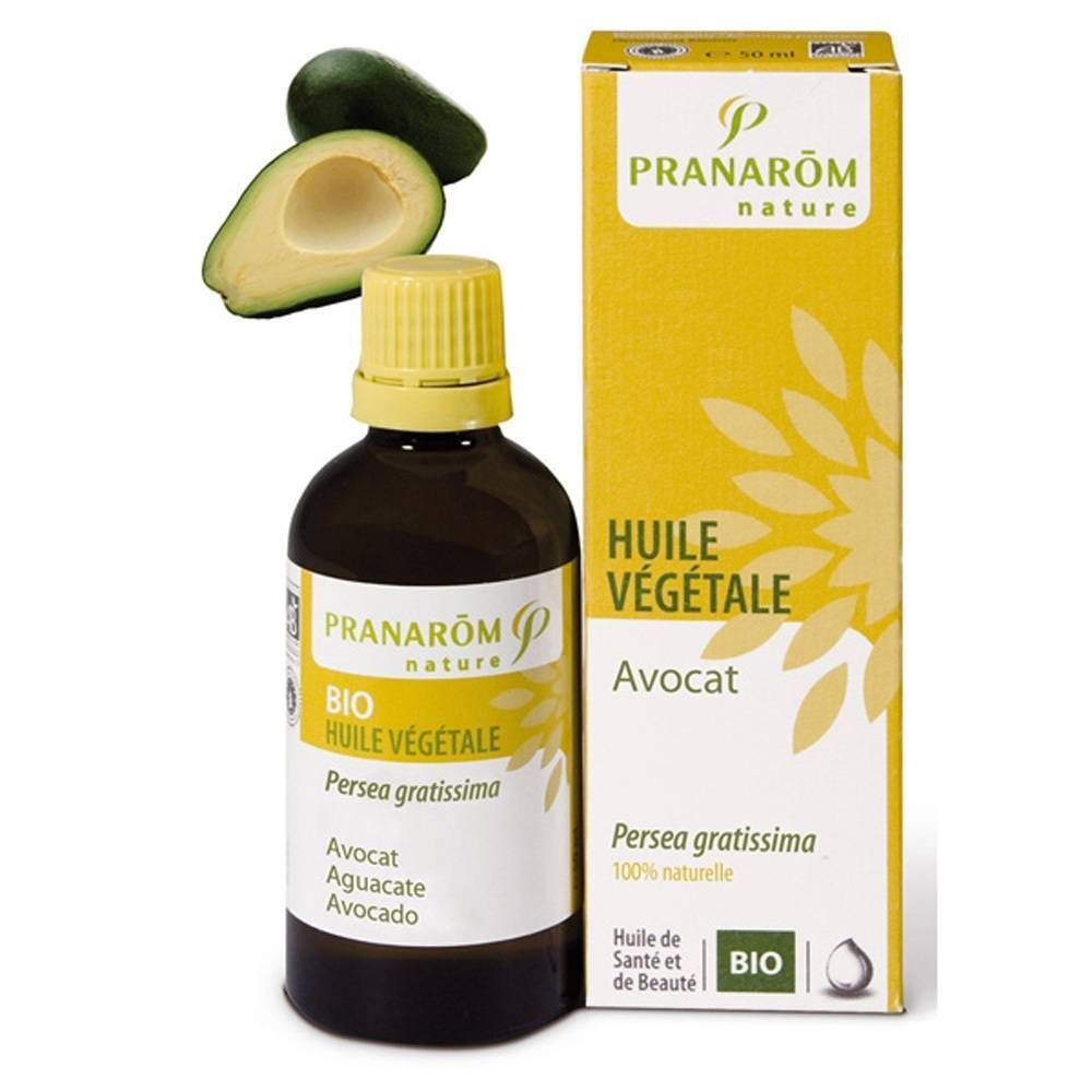 Flacon en verre brun avec étiquette jaune et bouchon jaune. Boîte avec illustration d'avocat. Texte: Huile Végétale.