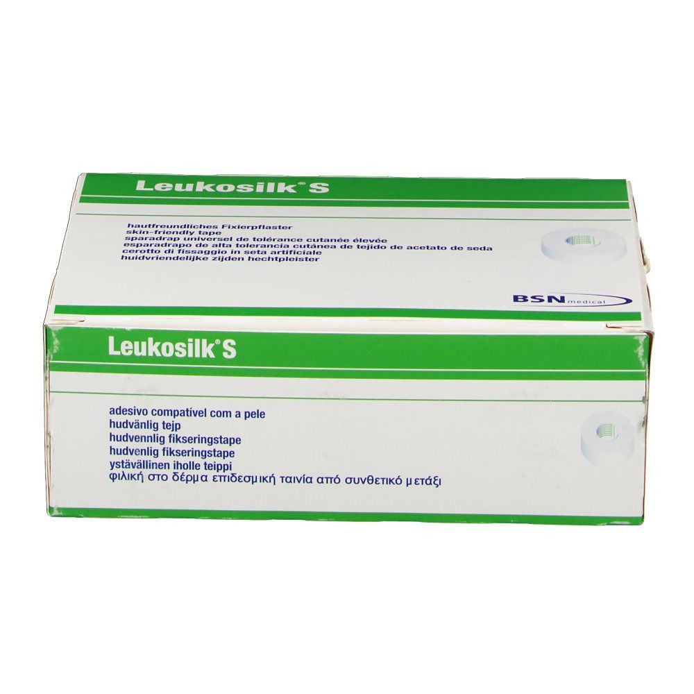 Karton von Leukosilk S. Weiß mit grünem Streifen. Produktname und Text in mehreren Sprachen. Marke BSN.