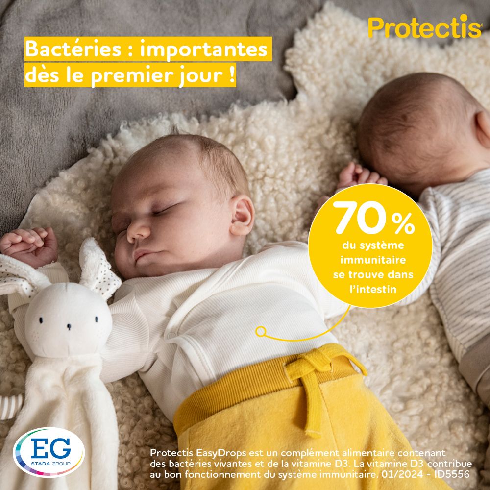 Deux bébés endormis. Fond jaune. Texte. 70% du système immunitaire dans l'intestin.