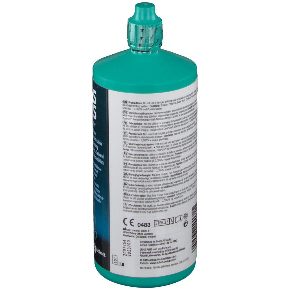 Achterkant van de groene fles. Wit etiket met tekst. Bevat informatie over gebruik en ingrediënten. CE-markering.