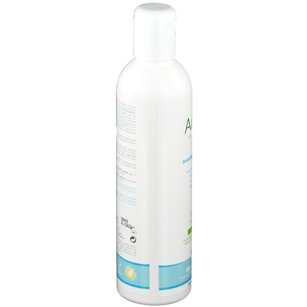Flacon blanc de shampooing Aurea Aloe Vera, vue latérale. Étiquette avec ingrédients et logo.