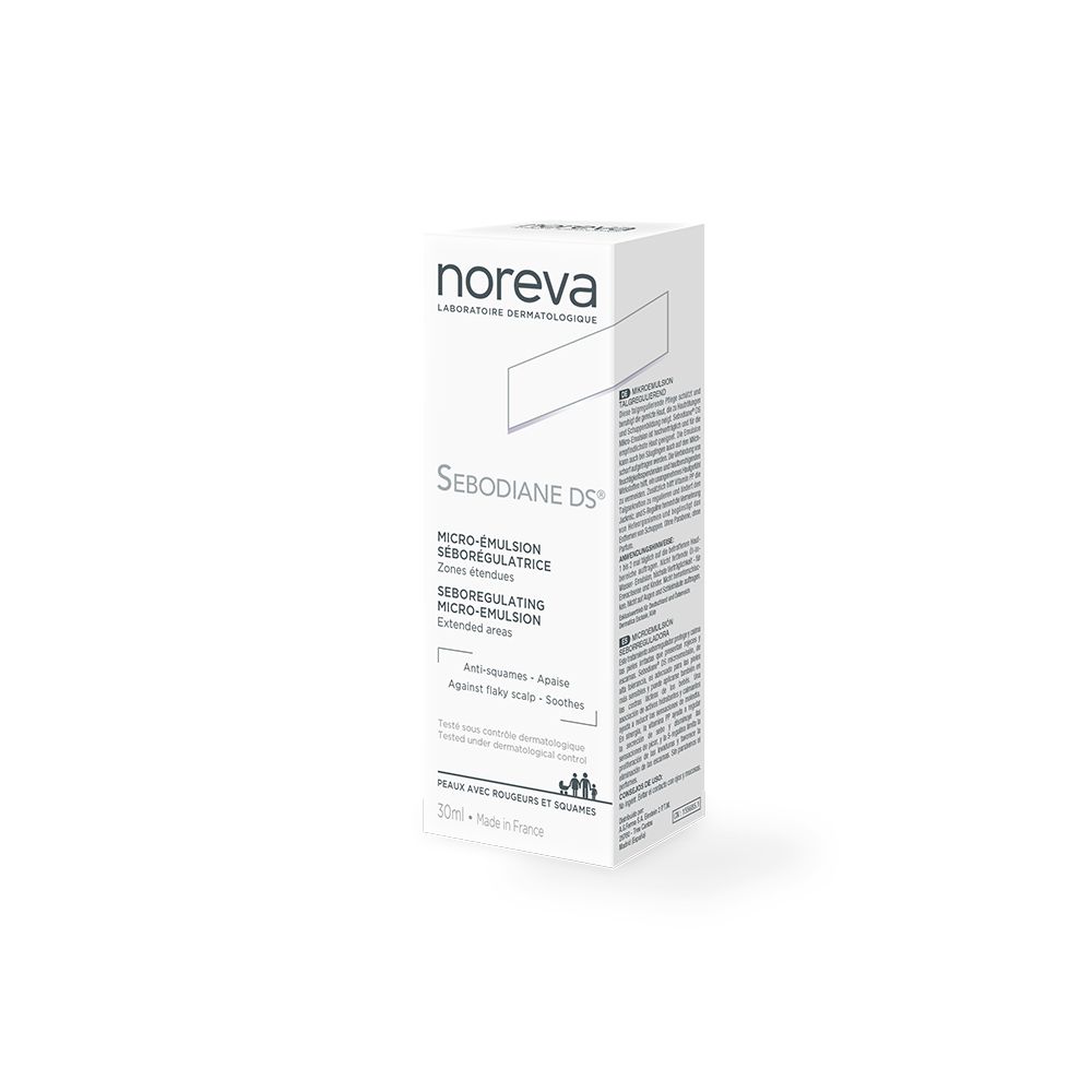 Boîte blanche avec logo et nom du produit. Texte: Micro-émulsion séborégulatrice. 30ml. Notice incluse.