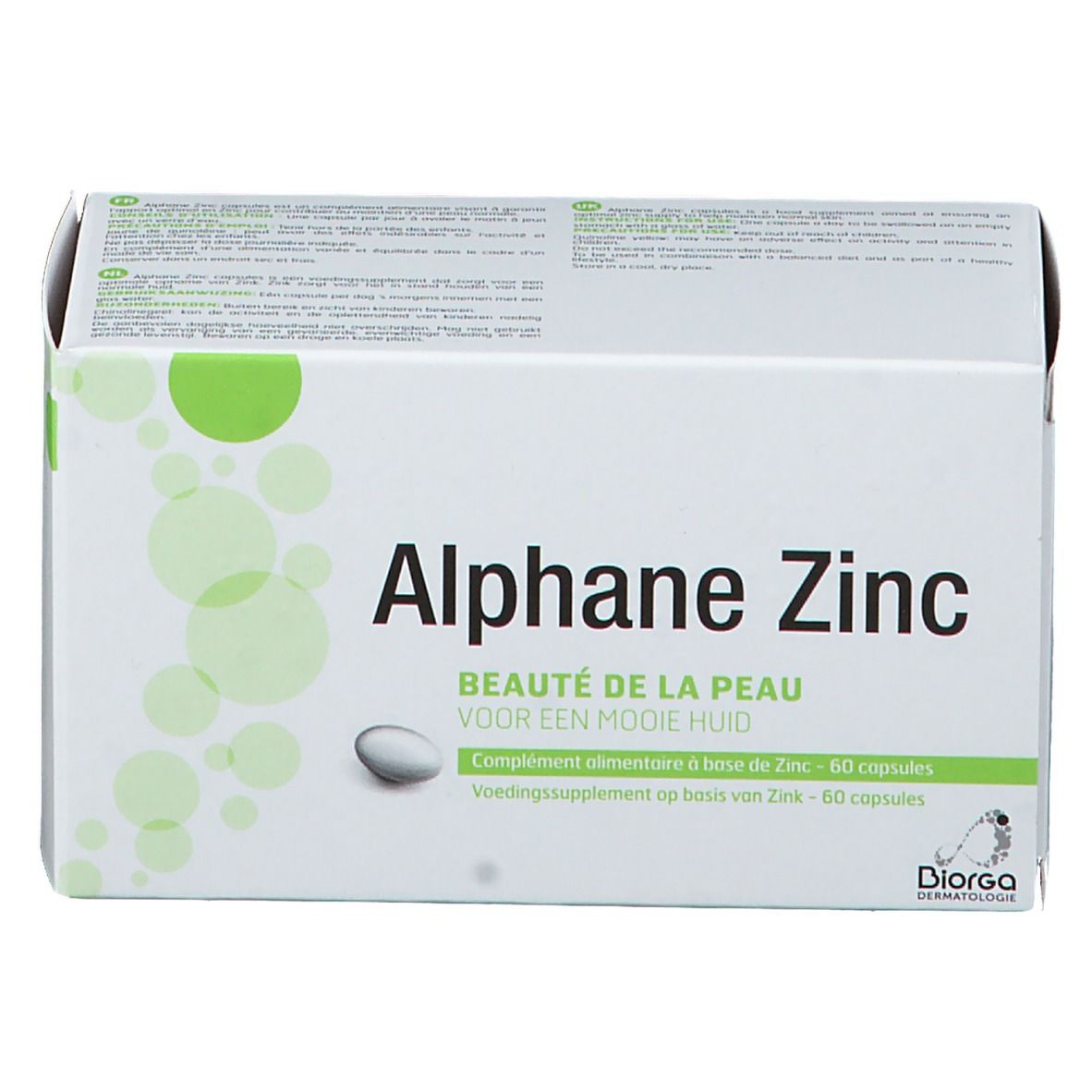 Boîte blanche avec éléments verts. Inscription: Alphane Zinc, Beauté de la Peau, 60 capsules. Marque Diorga Dermatologie.