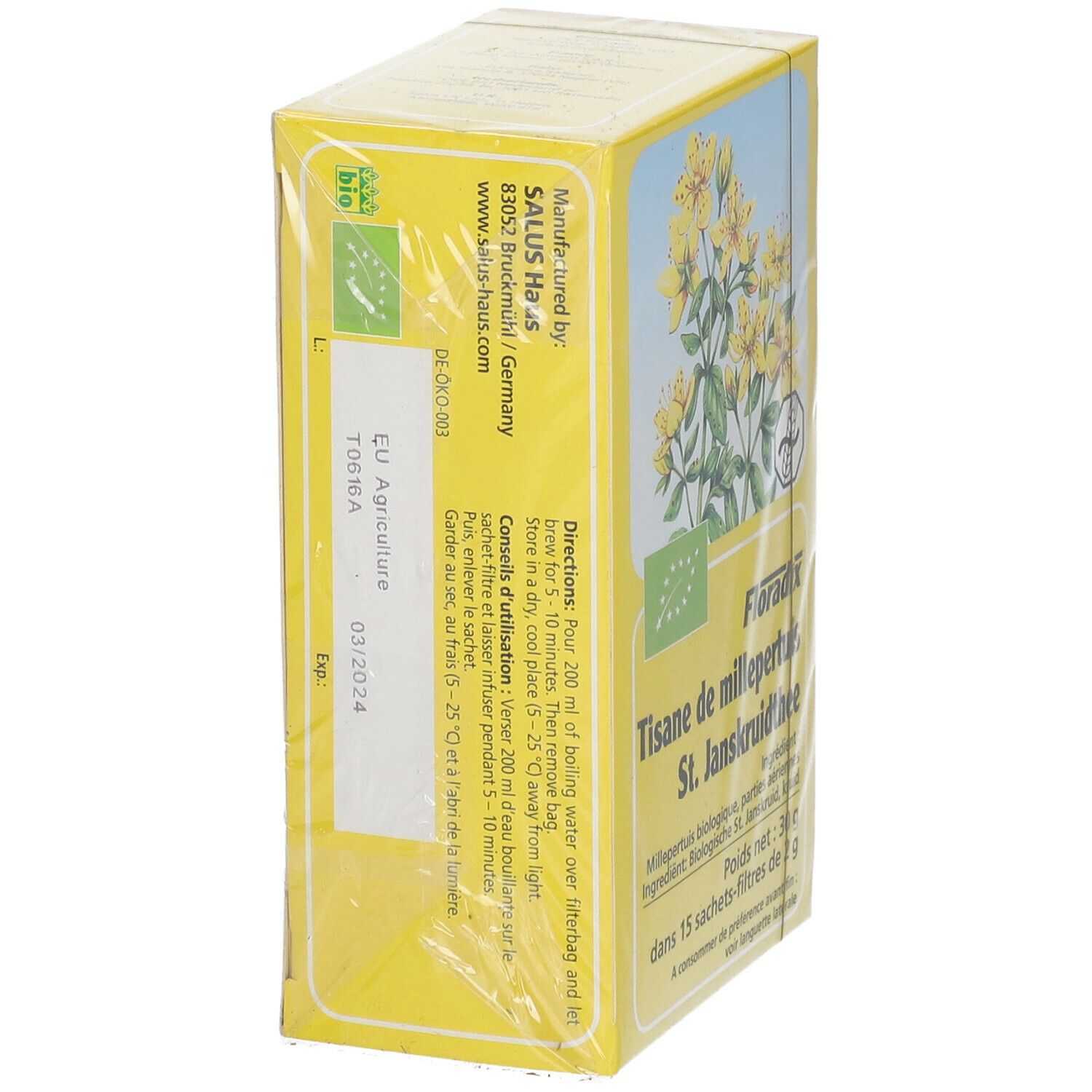 Boîte jaune de thé Floradix. Dos avec texte et label bio. Emballé dans du plastique. Date de péremption.