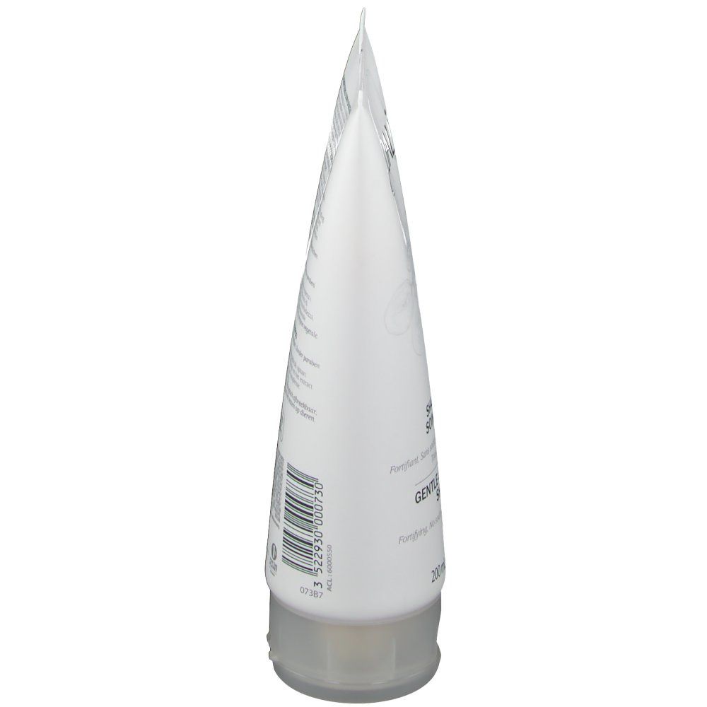 Tube blanc effilé. Informations produit imprimées. Fermeture transparente.