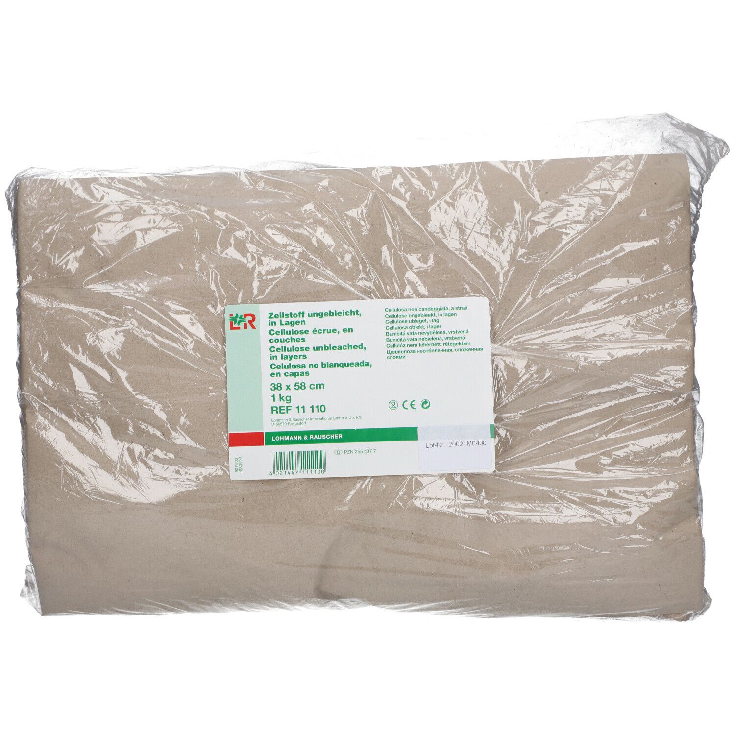 Compresse de cellulose non blanchie, emballée. Étiquette avec informations : 38 x 58 cm, REF 11 110.