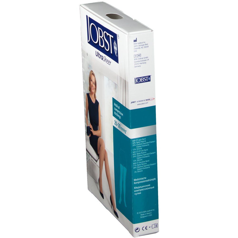 Emballage de bas de compression JOBST UltraSheer. Inscription : 20-30 mmHg. Femme en robe, modèle de jambe portant les bas. Bande bleue avec infos.