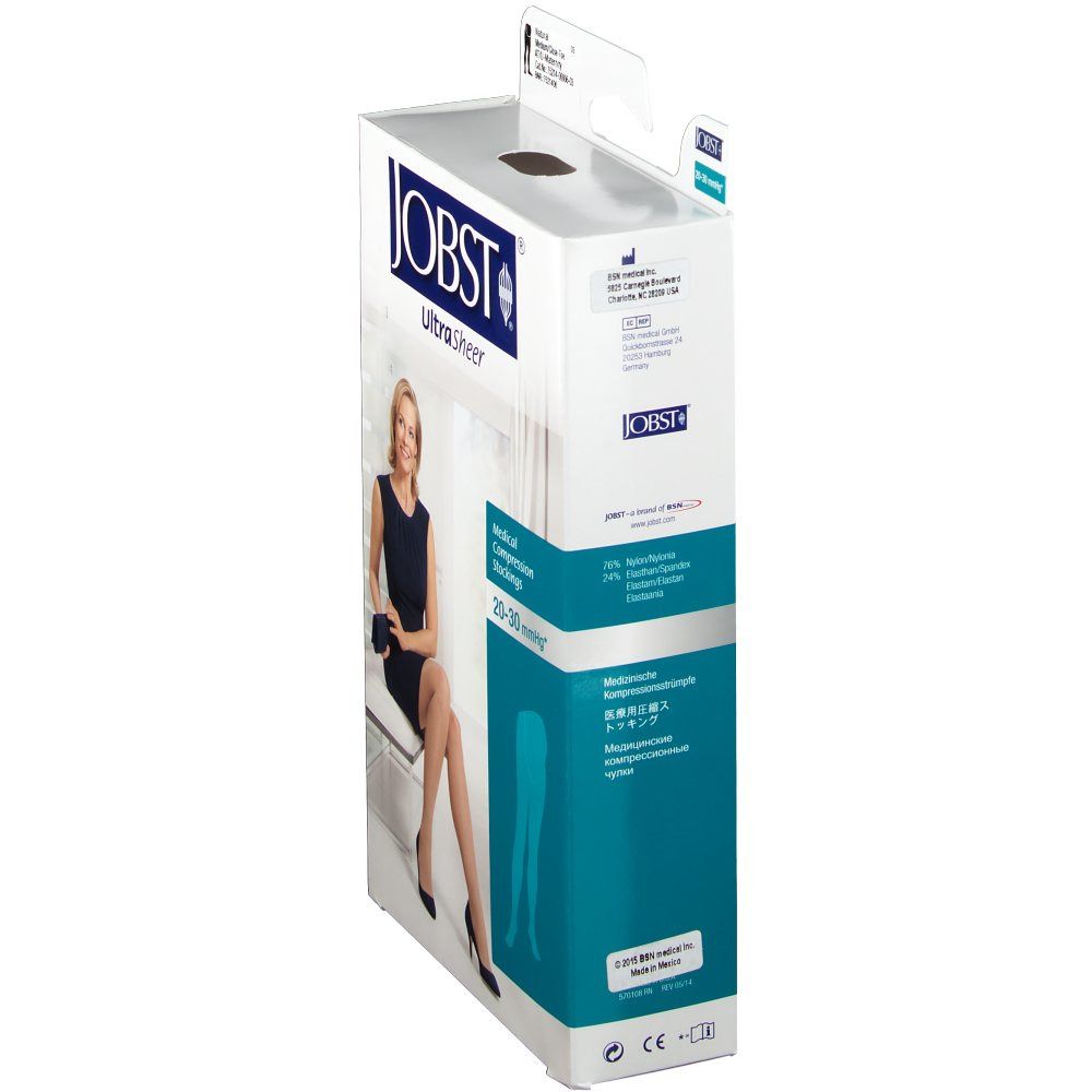 Emballage de bas de compression JOBST UltraSheer. Femme assise. Inscriptions : 20-30 mmHg, bas de compression médicale.