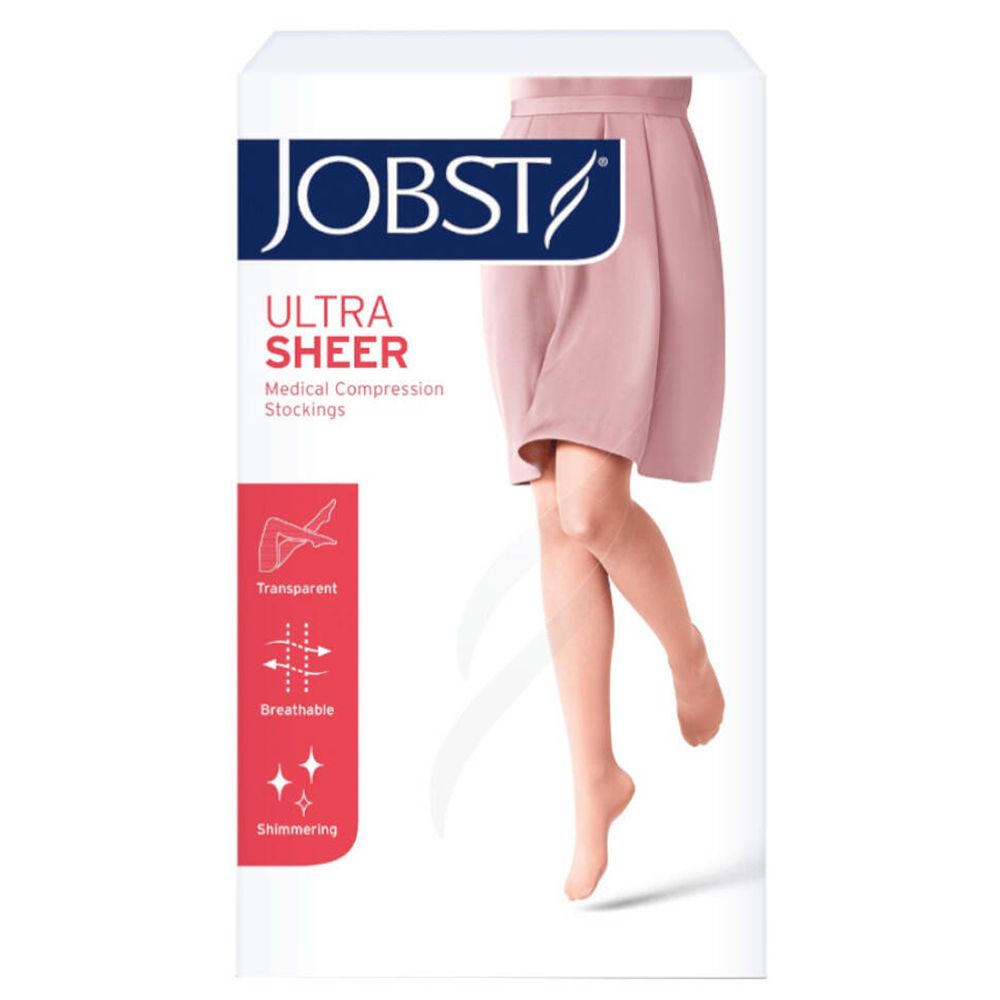 Emballage de bas de compression JOBST Ultra Sheer. Inscription: Transparent, respirant, scintillant. Image d'une jambe portant un bas.