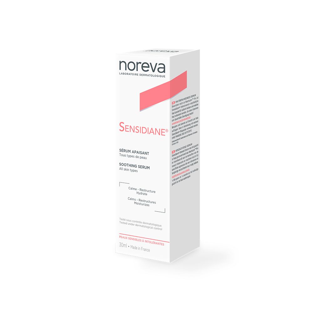 Emballage blanc pour le sérum SENSIDIANE® de Noreva. Accent rose. Texte et informations produit.
