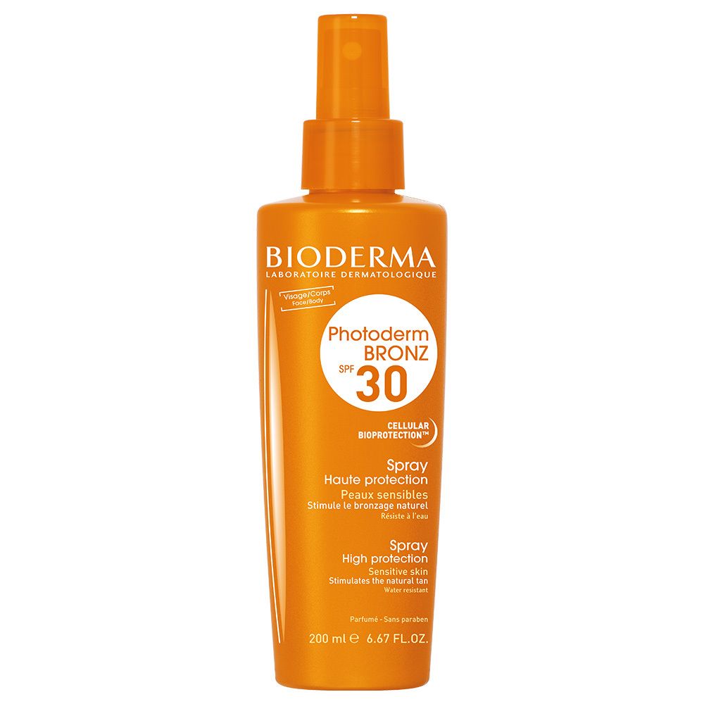 Flacone spray arancione con logo BIODERMA. Scritta: Photoderm BRONZ SPF 30. Alta protezione solare per pelli sensibili.