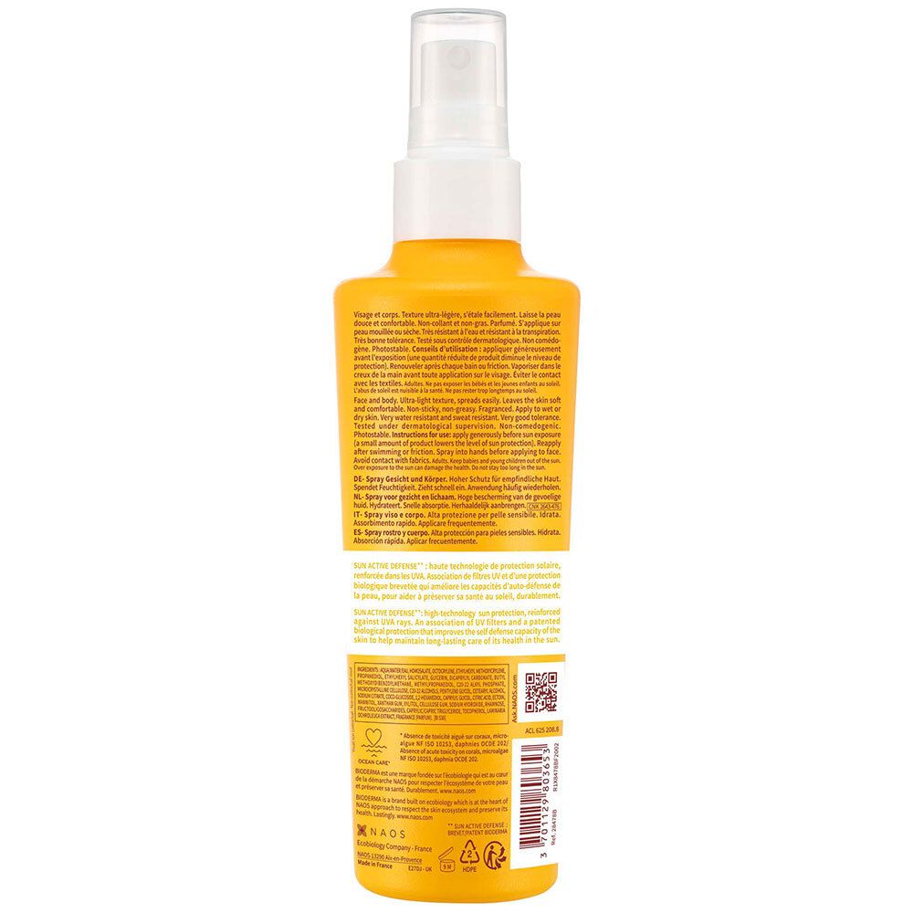 Dos d'un flacon spray jaune. Informations textuelles multilingues. Contient des informations sur le produit.