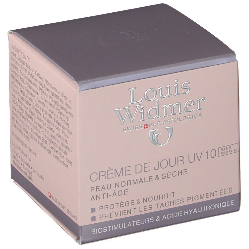 Roze doos met productnaam en logo. Tekst: Crème de Jour UV10, Peau normale & sèche, Anti-âge. Bevat hyaluronzuur.