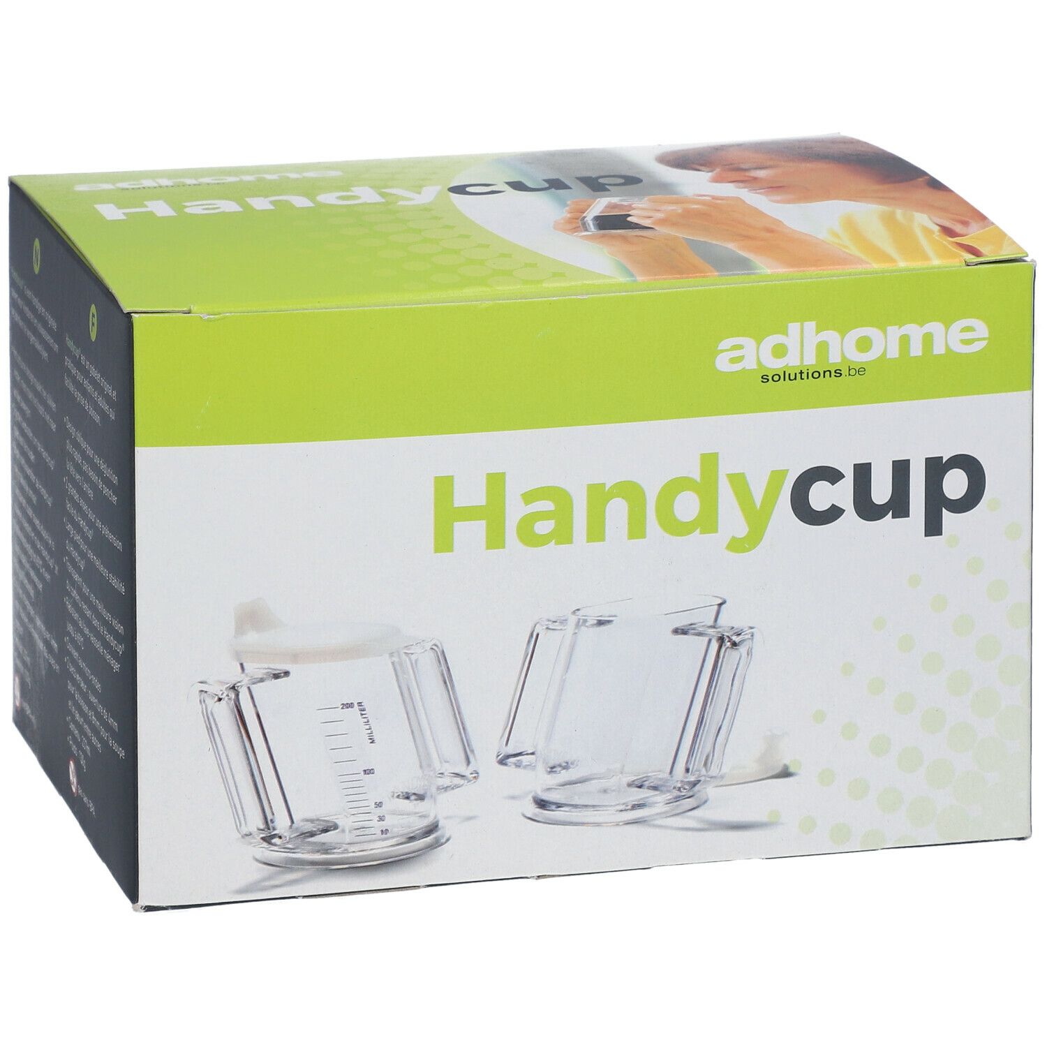 Verpakking van Handycup. Opschrift: Handycup, adhome solutions.be. Twee transparante bekers met deksels en handvatten afgebeeld.