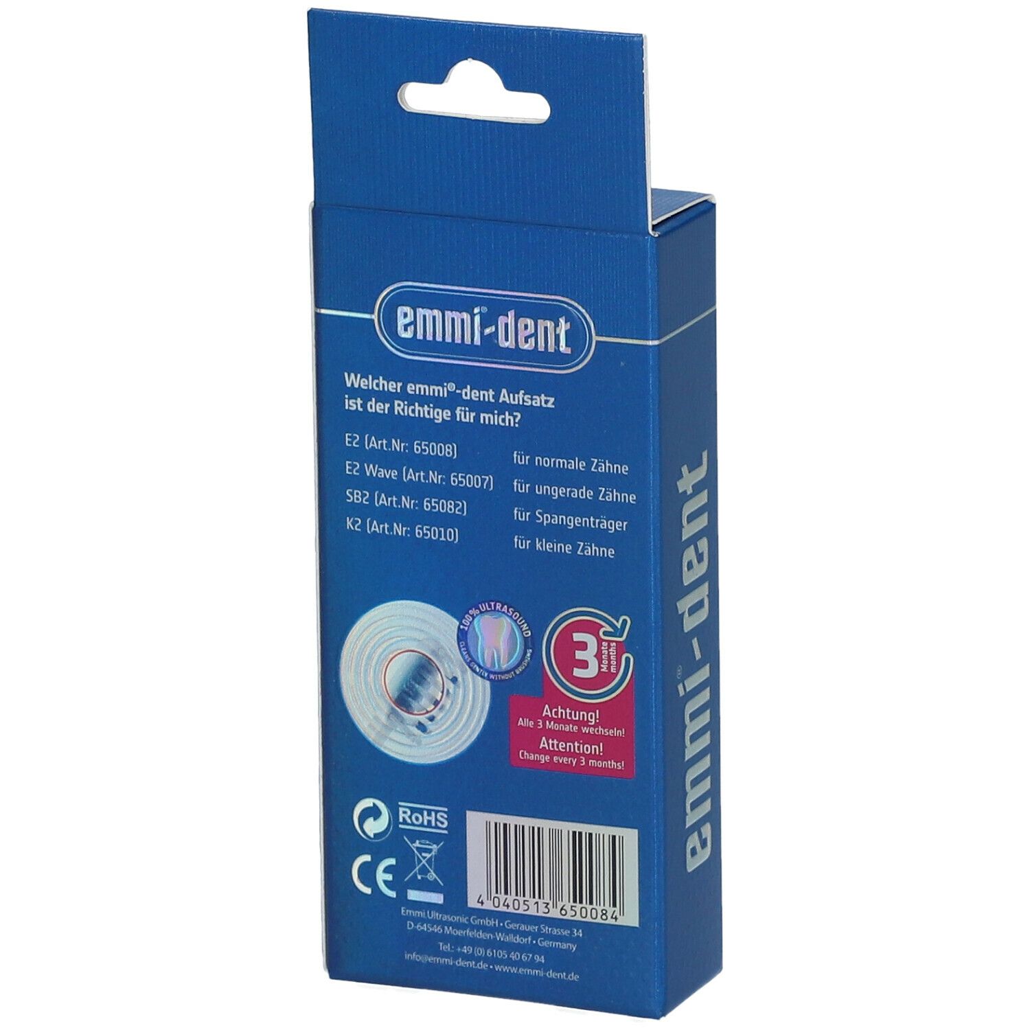 Emballage bleu avec informations produit. Inscription : emmi-dent. Contient des informations sur les têtes.