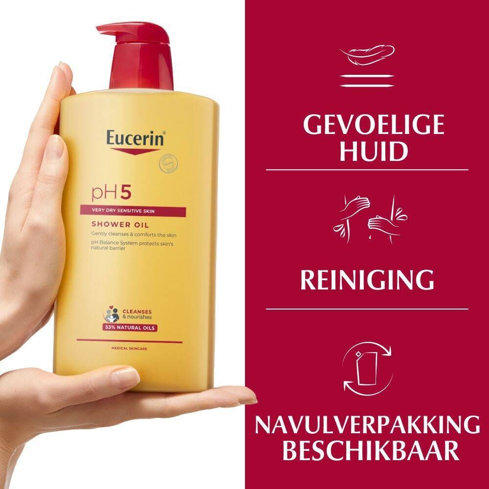 Hand houdt een gele fles Eucerin pH5 vast. Tekst: Zeer droge huid, douche-olie, reinigt en beschermt.