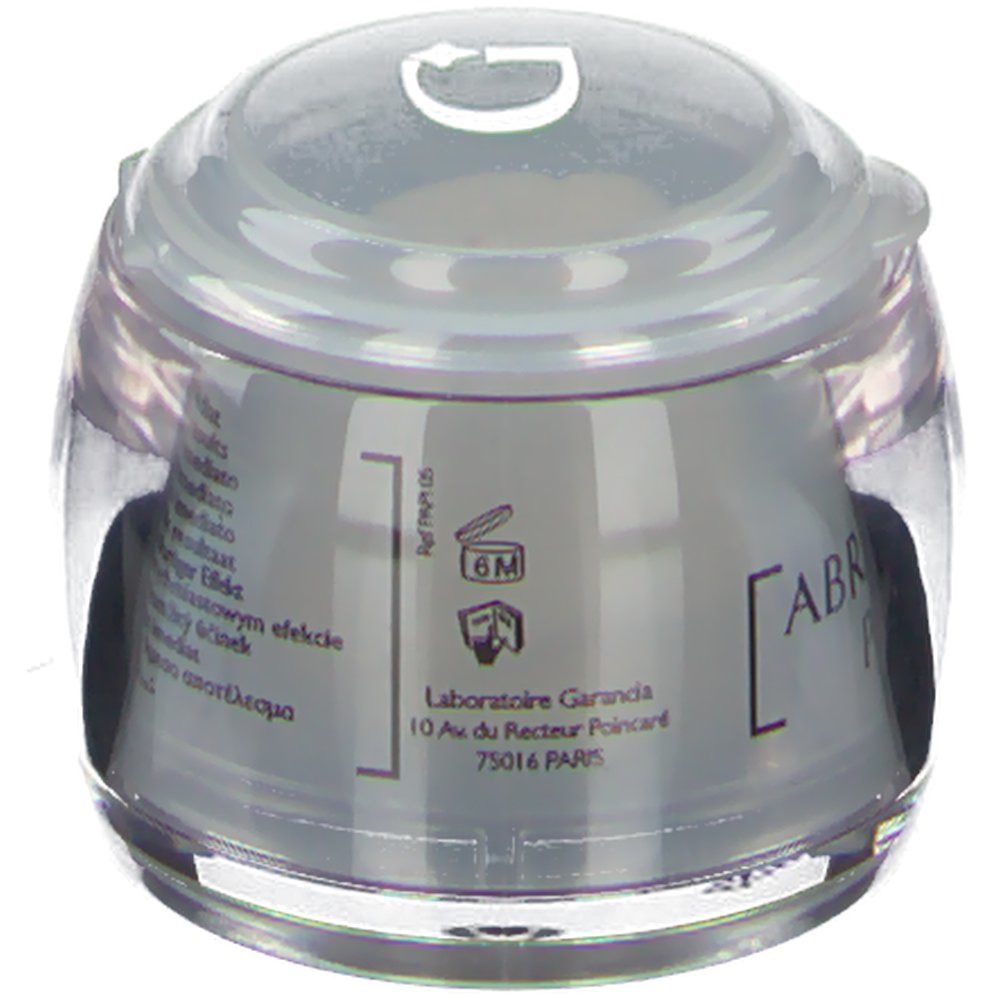 Garancia® Abracadabaume Perfect Illusion® Tiegel. Grauer Tiegel mit transparentem Deckel. Aufschrift: Laboratoire Garancia, 6M.