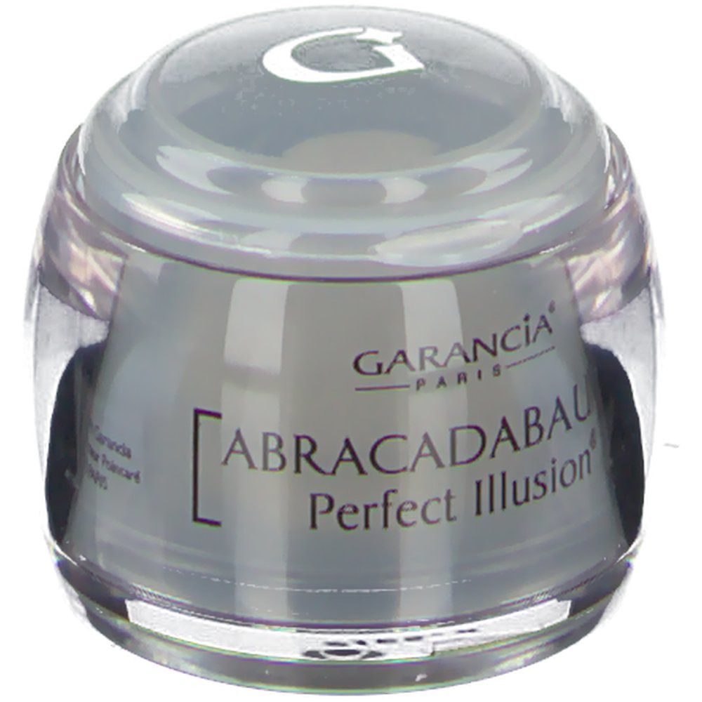 Garancia® Abracadabaume Perfect Illusion® Tiegel. Grauer Tiegel mit transparentem Deckel. Aufschrift: Garancia Paris, Abracadabaume Perfect Illusion®.