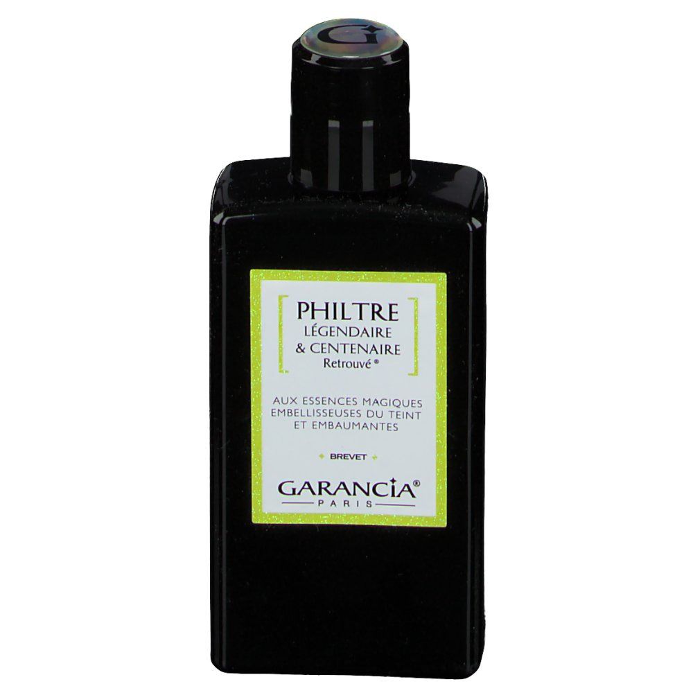 Flacon noir avec étiquette verte. Inscription: Philtre Légendaire & Centenaire Retrouvé. Marque: Garancia.