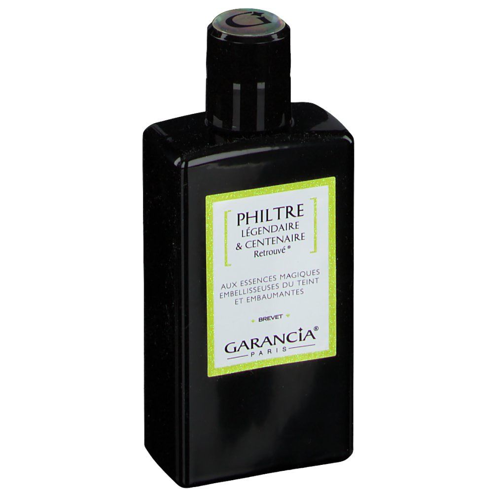 Flacon noir avec étiquette verte. Inscription: Philtre Légendaire & Centenaire Retrouvé. Marque: Garancia.