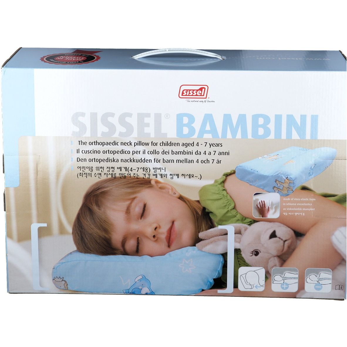 Emballage avec oreiller. Inscription: Sissel Bambini, oreiller orthopédique pour enfants. Enfant dormant sur l'oreiller.