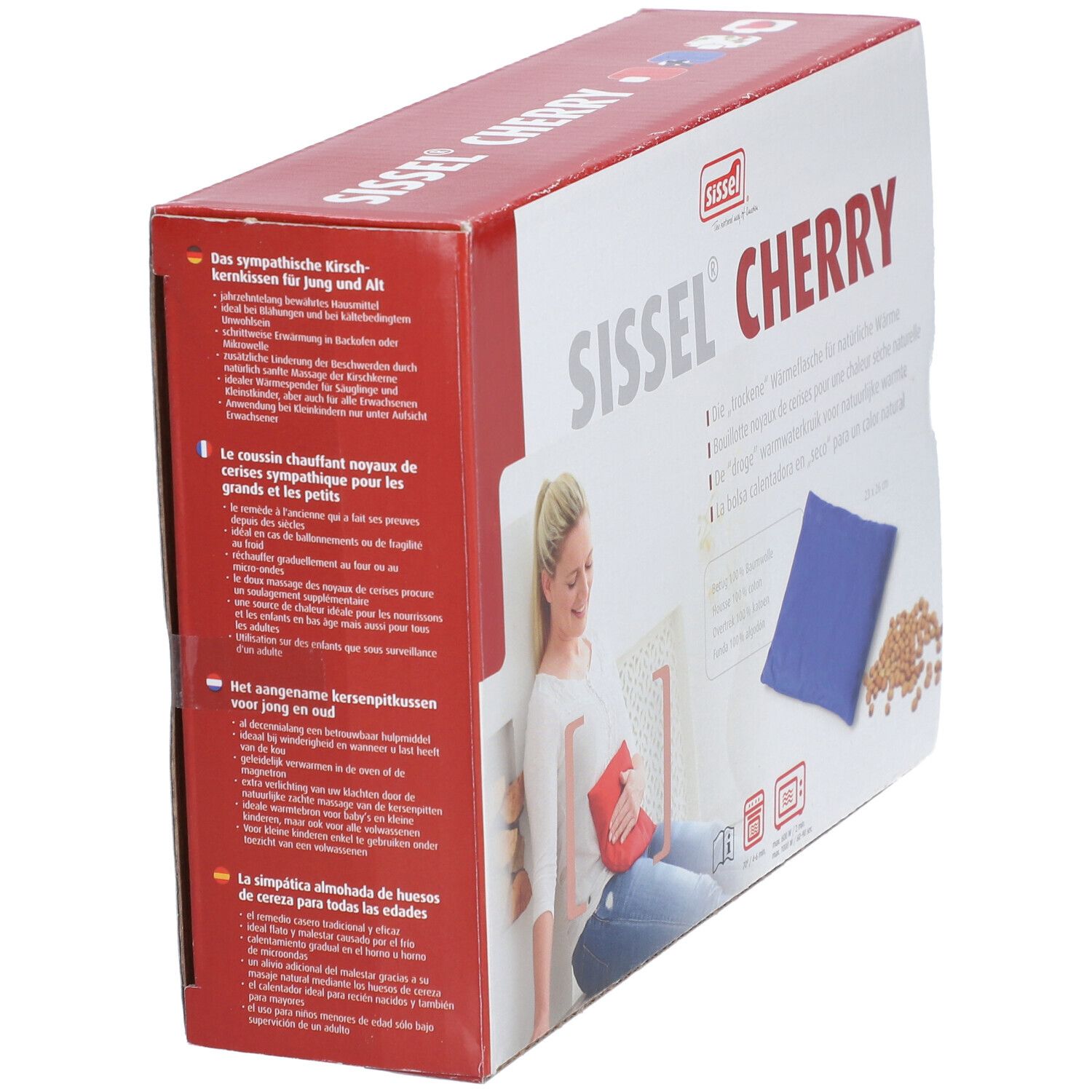 Verpackung Sissel Cherry. Blaues Kissen, Kirschkerne. Frau sitzt mit rotem Kissen. Text in mehreren Sprachen. Perspektivische Ansicht.