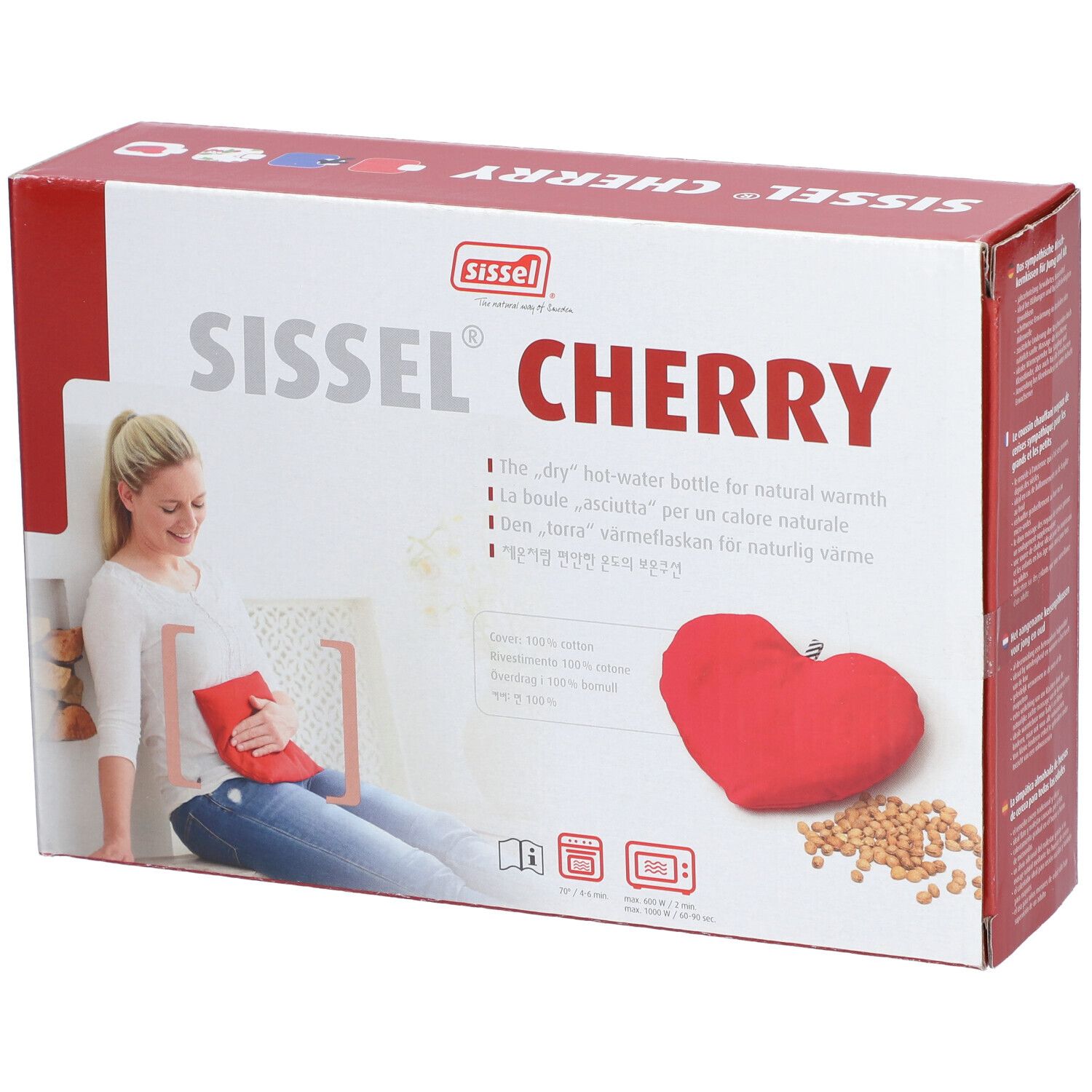 Verpackung Sissel Cherry. Rotes Herz-Kissen und Kirschkerne. Frau sitzt mit rotem Kissen. Text in mehreren Sprachen.