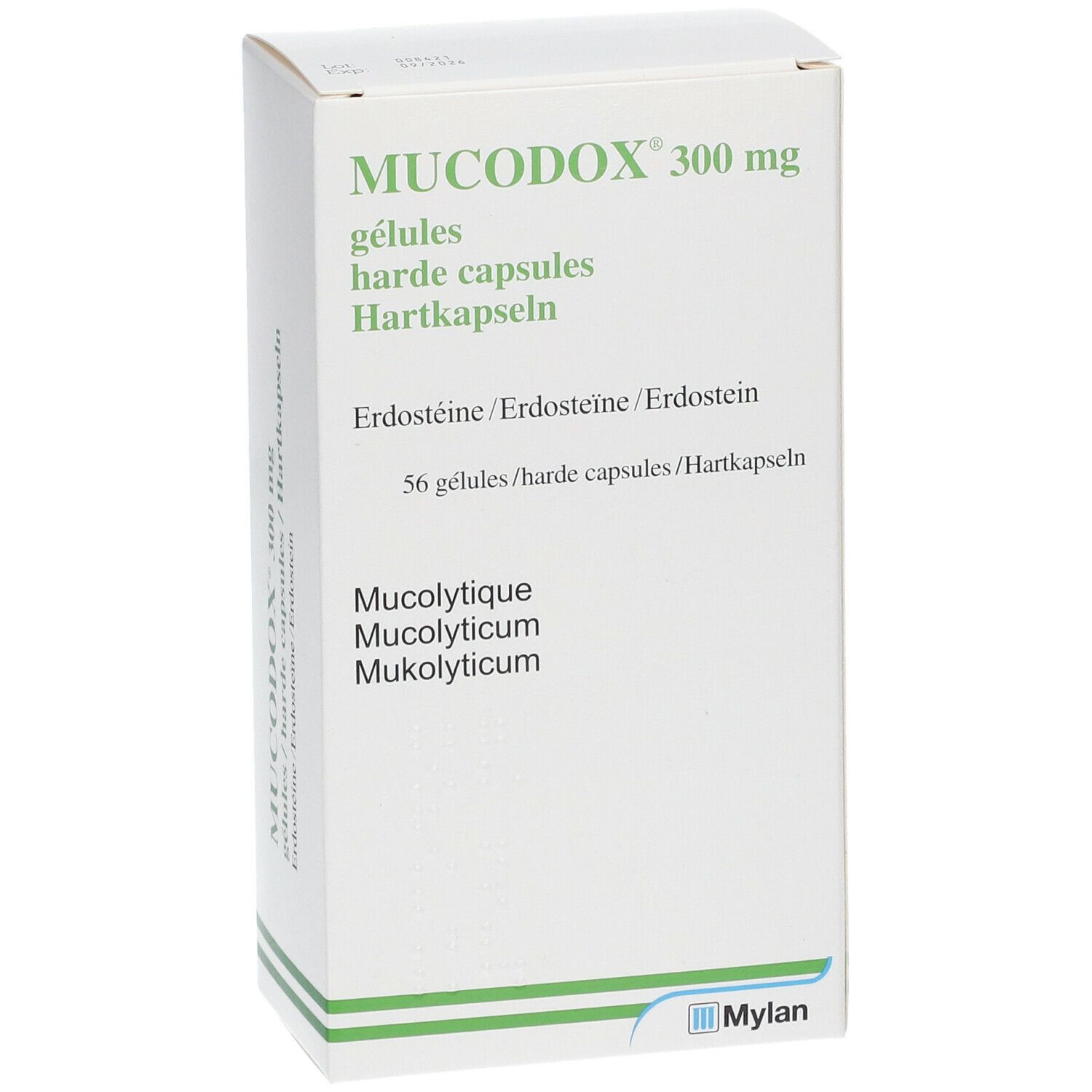 Boîte blanche Mucodox 300 mg, gélules. Texte en allemand, français, néerlandais. Logo Mylan.