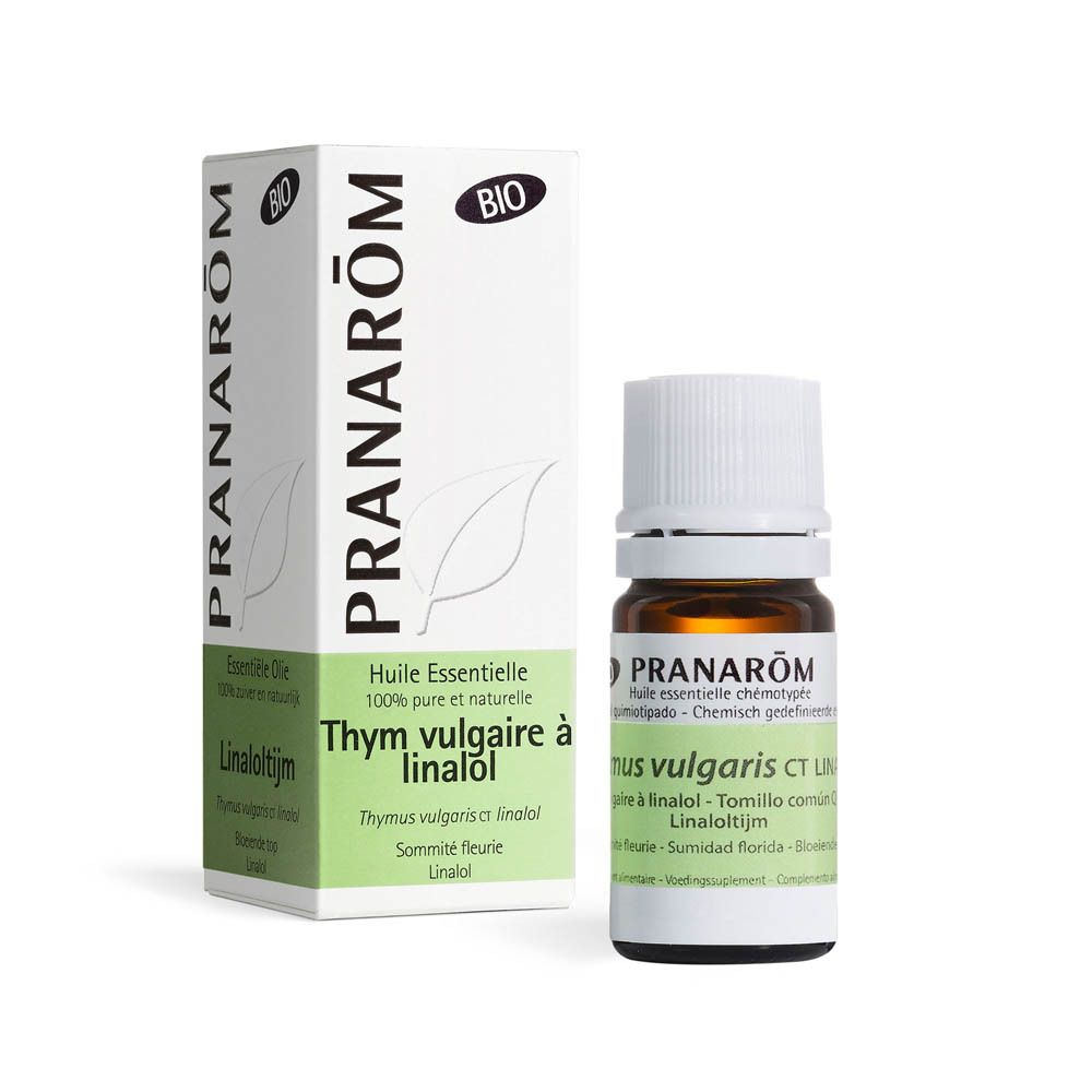 Braunglasflasche und Karton mit Produktnamen. Aufschrift: PRANAROM Thymian Linalool. Bio-Zertifizierung.