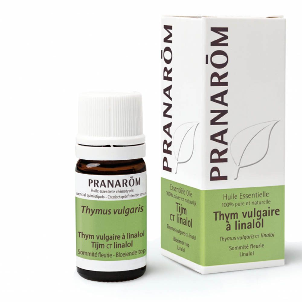 Braune Glasflasche mit weißem Deckel und Karton. Aufschrift: PRANAROM, Thymus vulgaris, Thymian ct linalol.