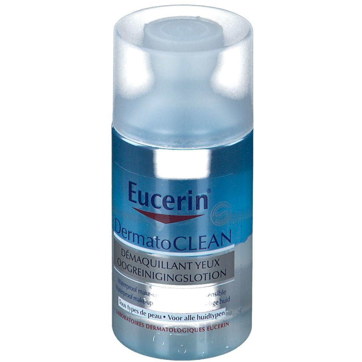 Cilindrische fles met blauw etiket. Eucerin DermatoCLEAN oogreinigingslotion. Transparante dop.