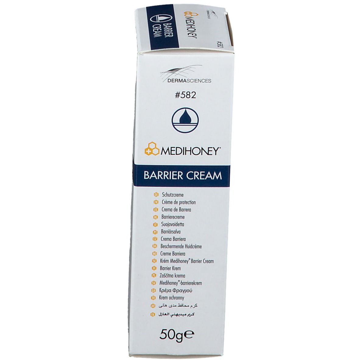 Boîte, vue en biais. Inscription: MEDIHONEY Barrier Cream. Logo et texte multilingue. 50g.