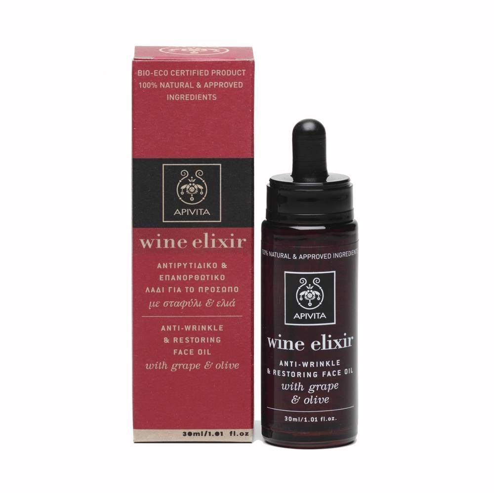 Gesichtsöl-Fläschchen und Verpackung. Aufschrift: Wine Elixir, Anti-Wrinkle & Restoring Face Oil. Mit Traube & Olive. Bio-zertifiziert.