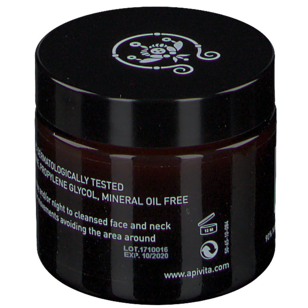 Donkerbruine pot met zwarte deksel. Opschrift: Wine Elixir Anti-Wrinkle & Firming Rich Face Cream. Tekst: Houdbaarheidsdatum.