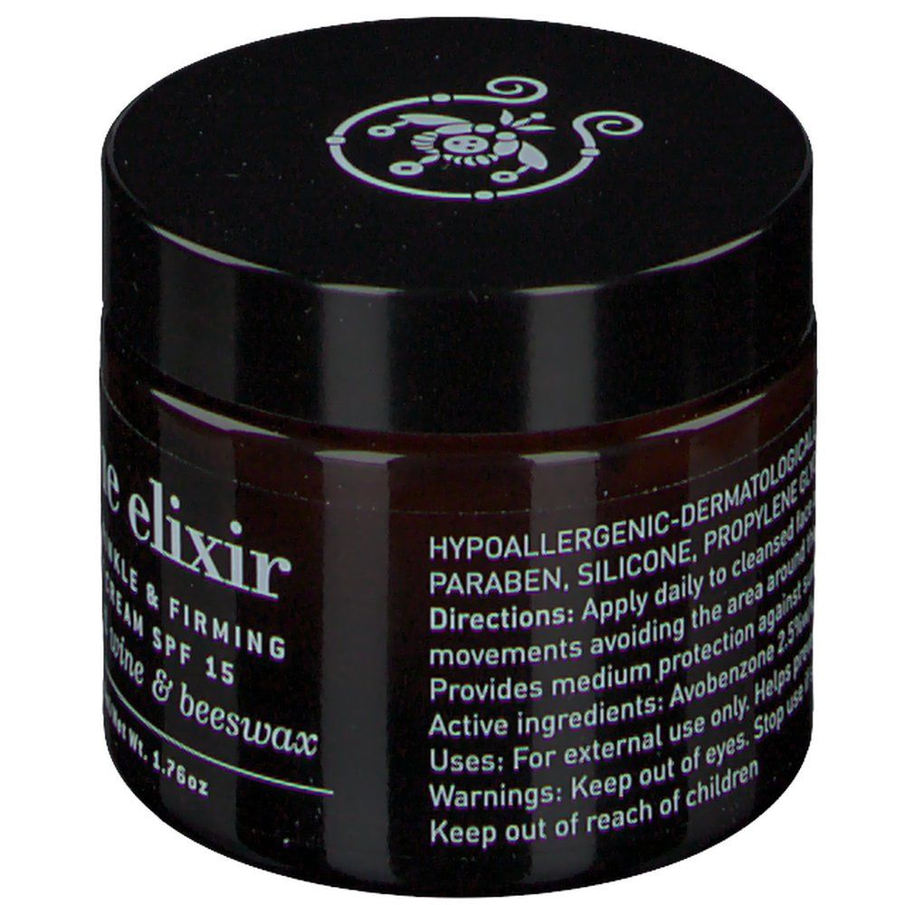 Crème brune en pot de verre avec couvercle noir. Inscription : wine elixir, Anti-Wrinkle & Firming Day Cream SPF 15. Texte au dos.