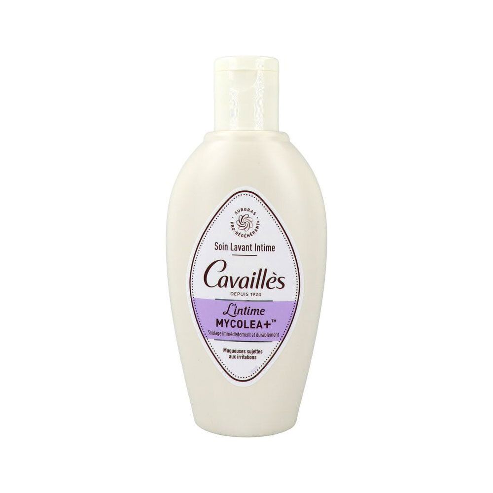 Flacon blanc avec bouchon rabattable. Étiquette avec nom et marque du produit. Soin lavant intime.