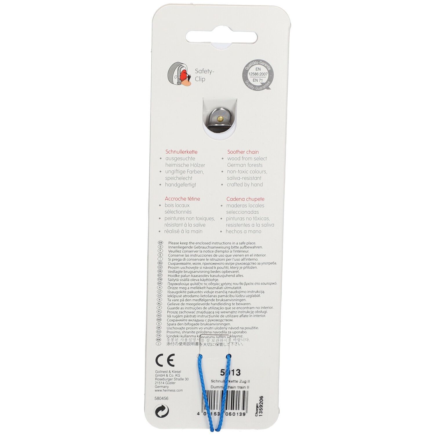 Rückseite der HEIMESS Schnullerkette. Mit Sicherheitsclip. Text in Deutsch, Englisch, Französisch, Italienisch. CE-Kennzeichnung.