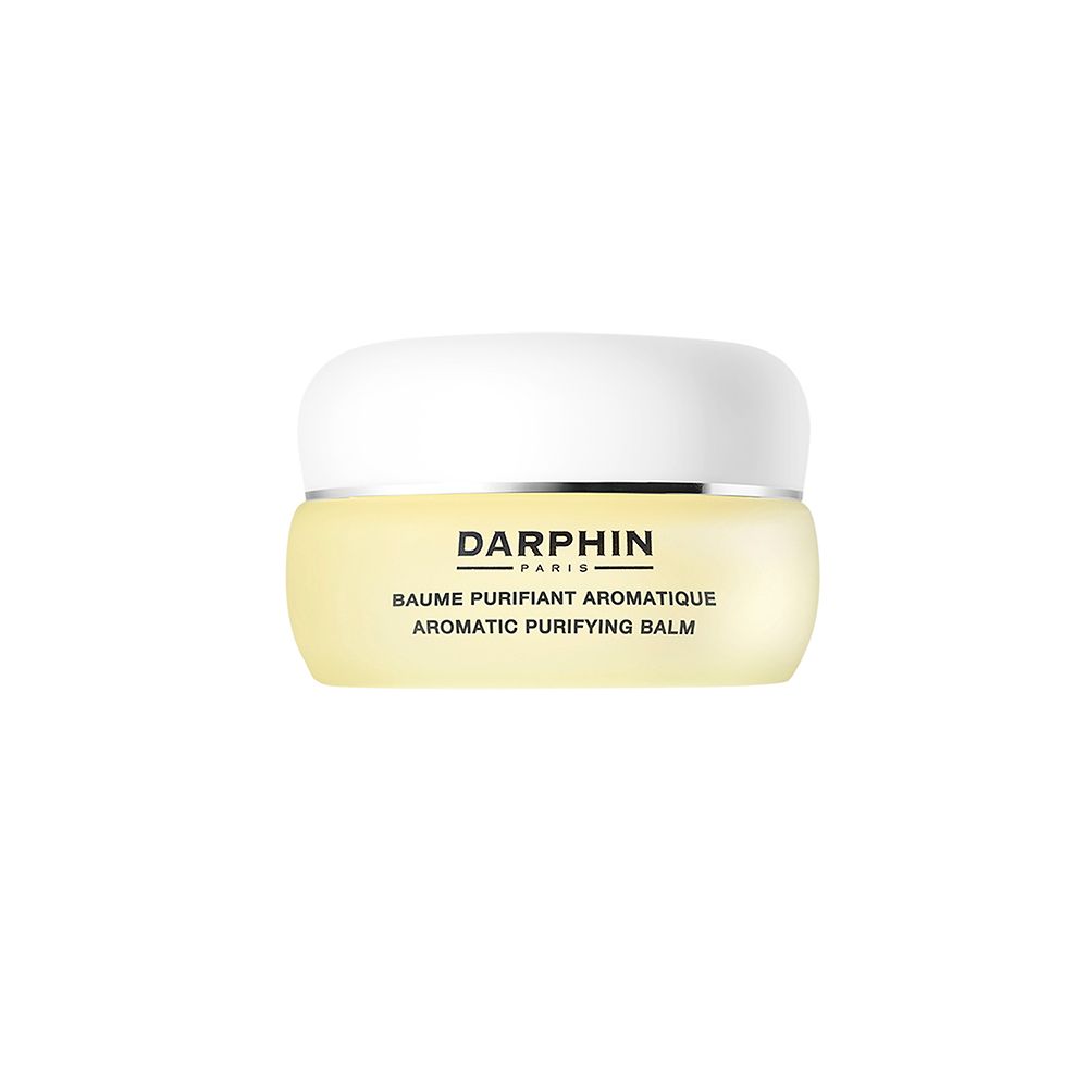 Pot avec couvercle blanc et contenu jaune. Inscription : Darphin, Baume Purifiant Aromatique, Aromatic Purifying Balm.