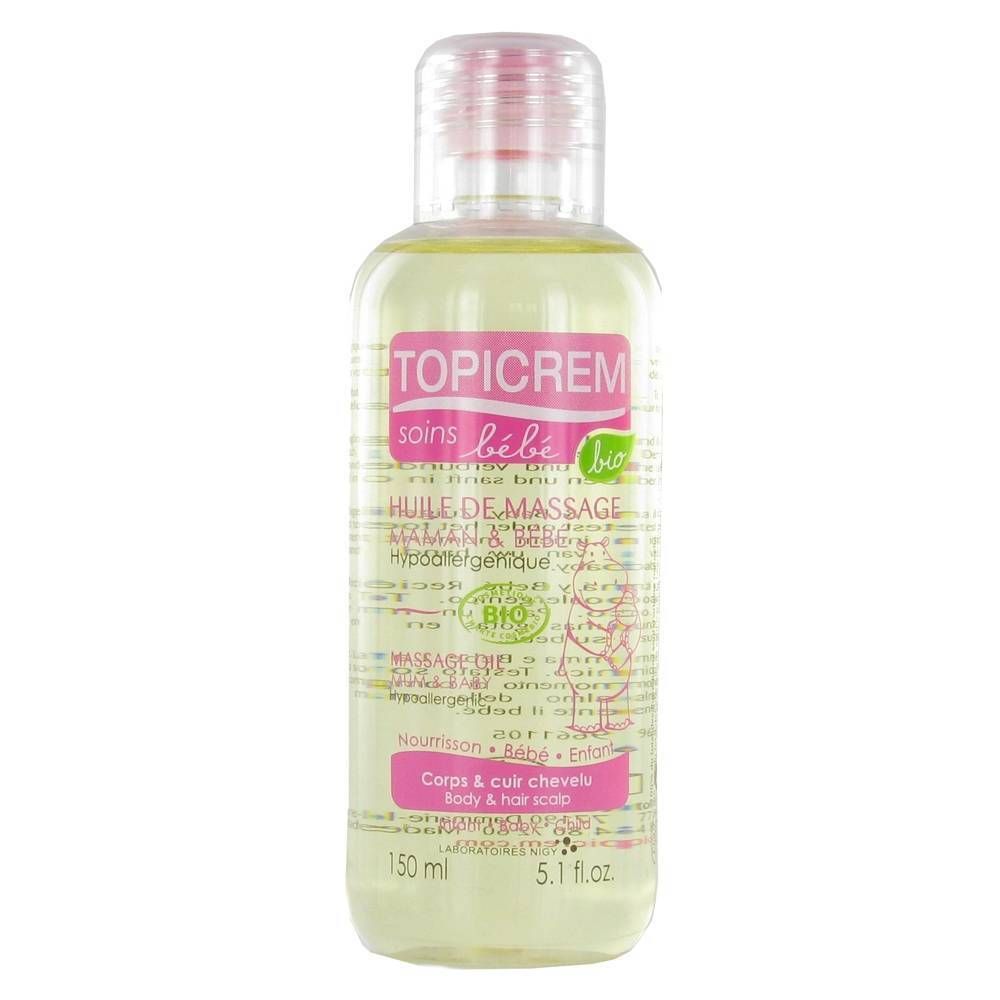 Huile de massage TOPICREM bébé bio. Flacon avec bouchon rose. Étiquette avec informations et label bio.