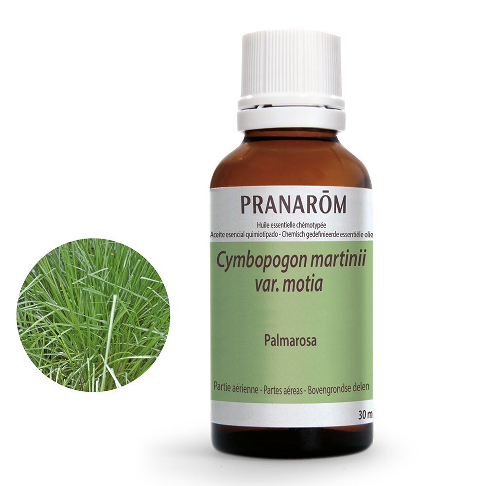 Flacon en verre brun avec bouchon blanc. Étiquette avec nom du produit et illustration de plante. Marque : Pranarôm.