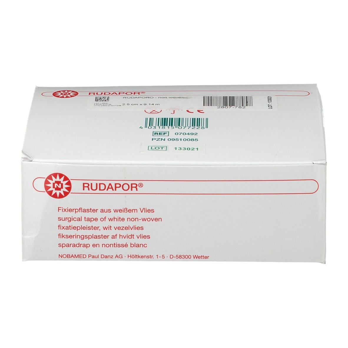 Weiße Verpackung mit RUDAPOR®-Logo. Text: Fixierpflaster aus weißem Vlies. CE-Kennzeichnung.