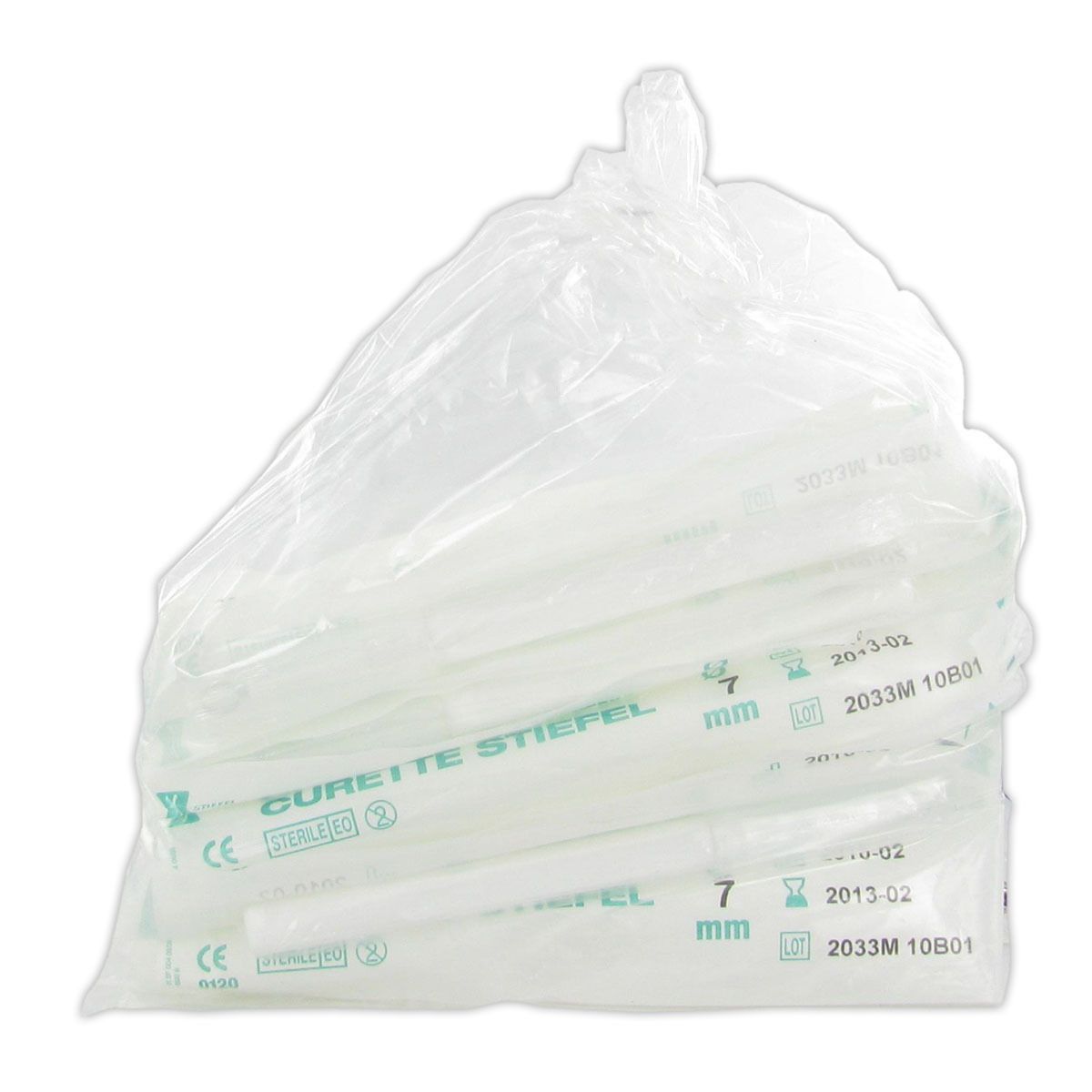Sachet de Curette Stiefel 7 mm. Plusieurs curettes stériles emballées dans un sachet transparent.