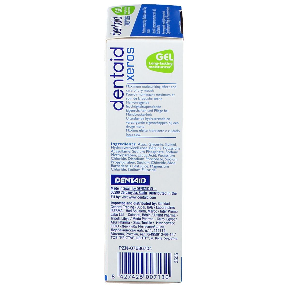 Boîte de gel dentaire avec nom du produit et liste des ingrédients. Texte en plusieurs langues.