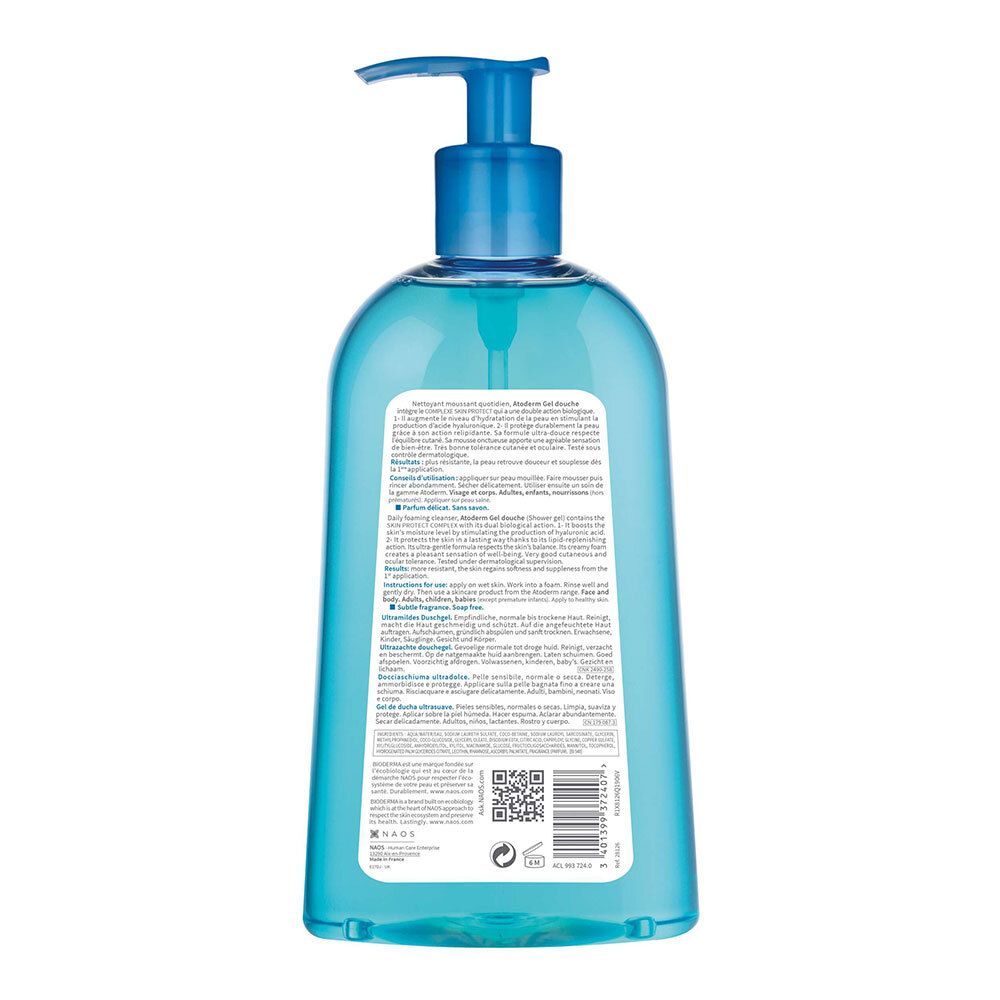 Achterkant van de BIODERMA Atoderm Duschgel fles. Tekstinformatie en QR-code. Blauwe fles met pomp.